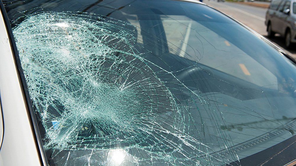 Vehicle during windscreen replacement service